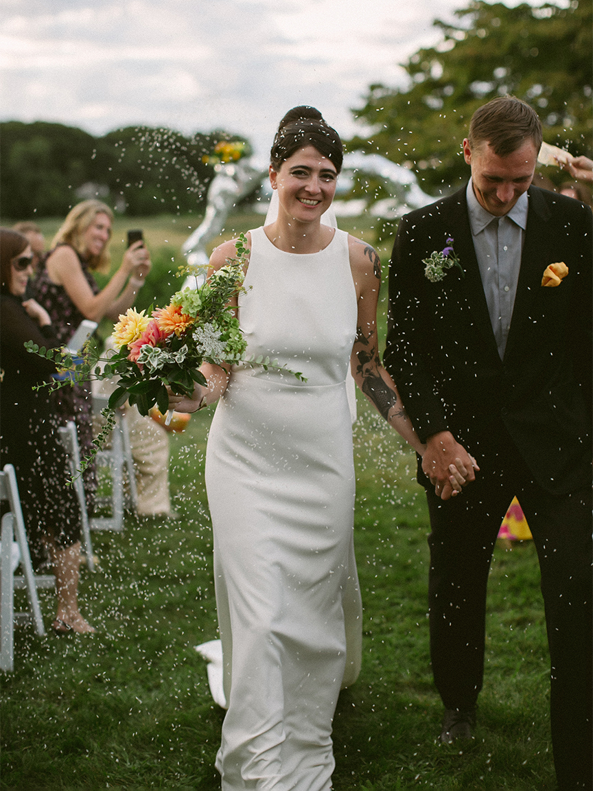 couple walking down aisle