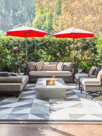 outdoor patio with red umbrellas