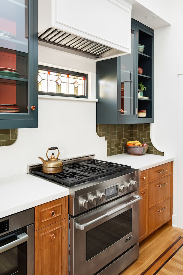 Kitchen with red and blue cabinets