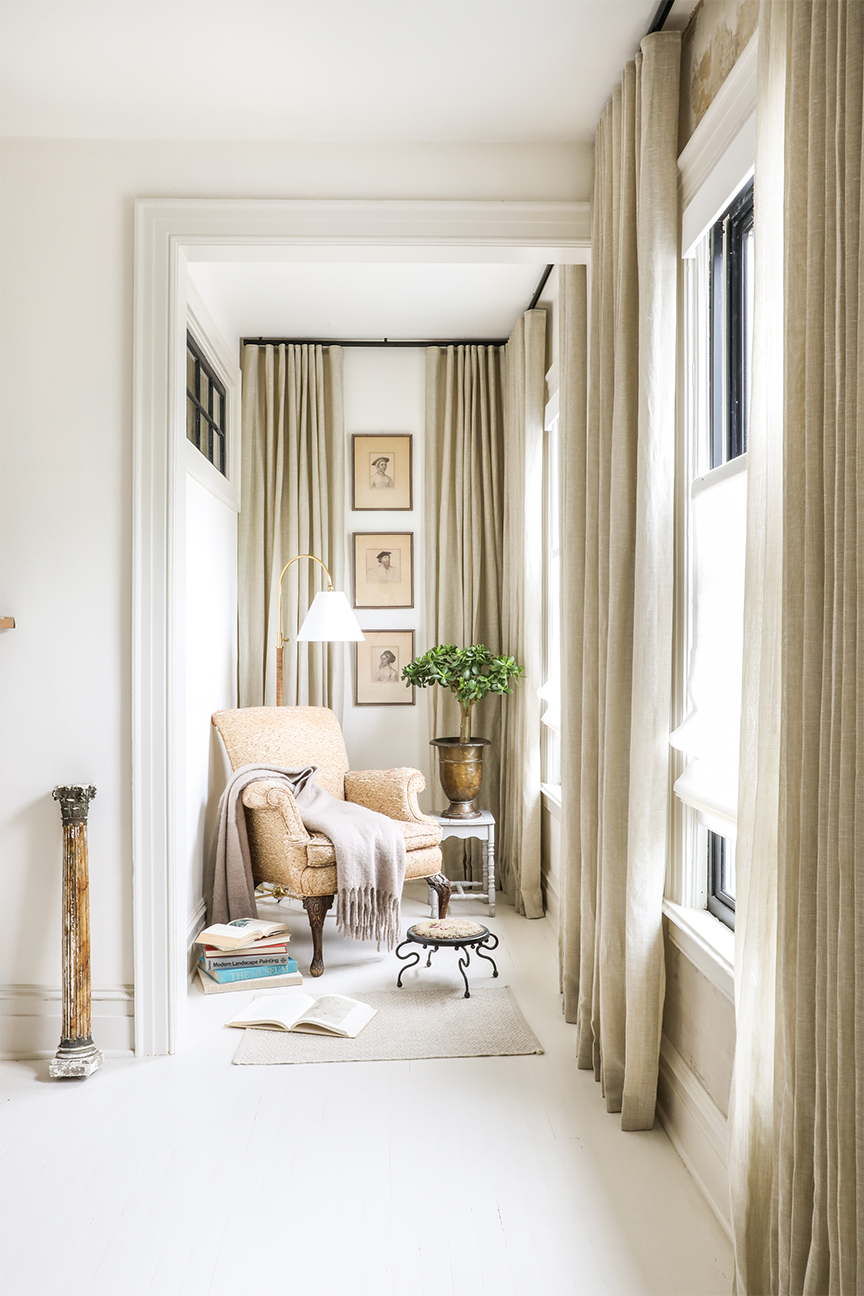 reading nook with beige curtains