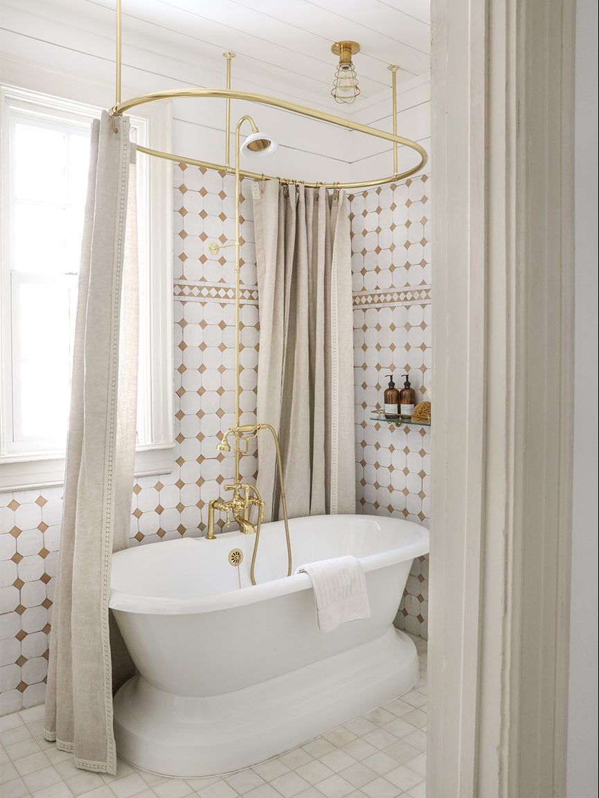 shower nook with tiled bathtub