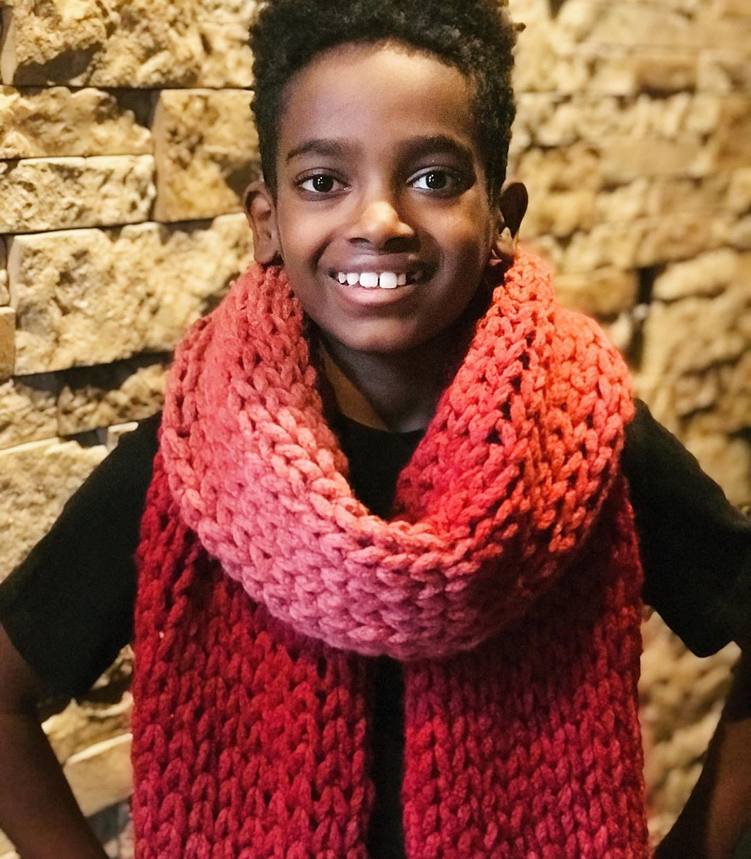 Jonah Larson wearing a scarf