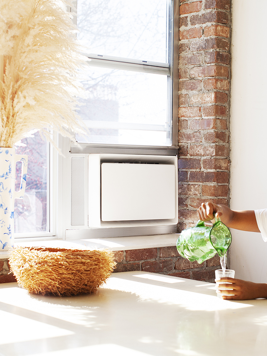 kitchen table with white window AC unit