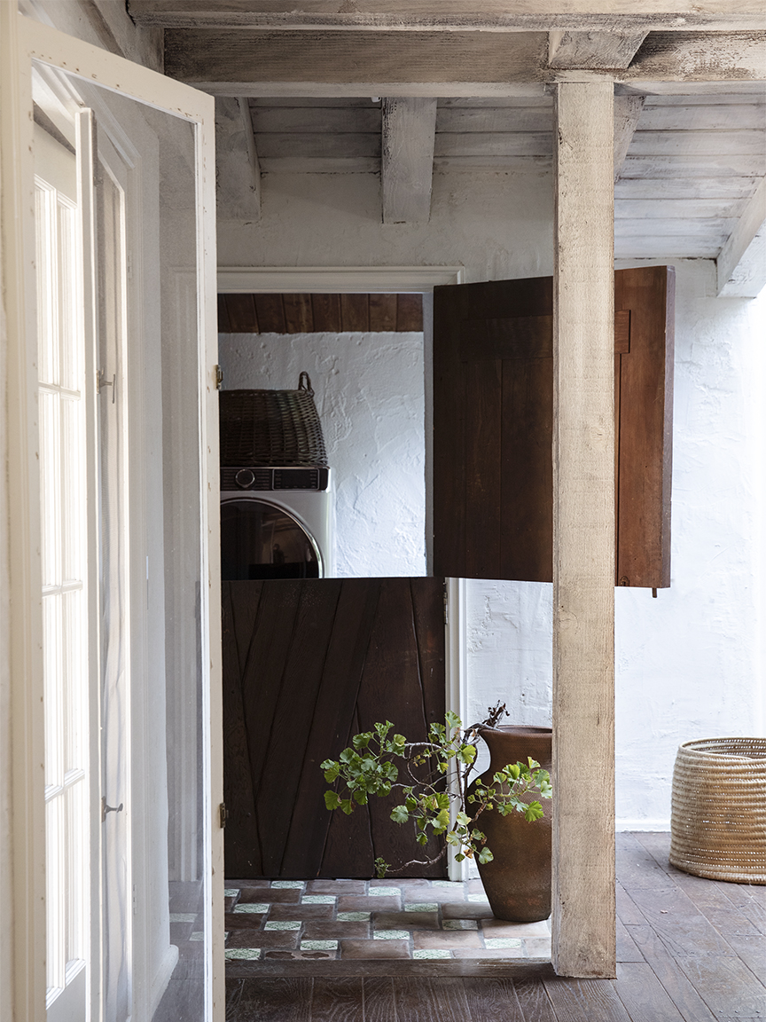 hallway leading to dutch door laundry room