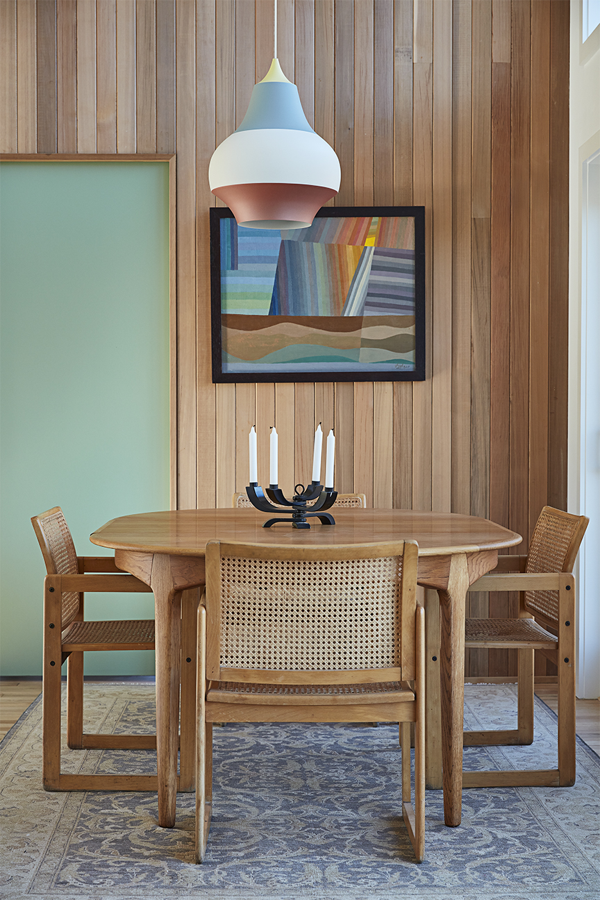 round wood table and cane chairs