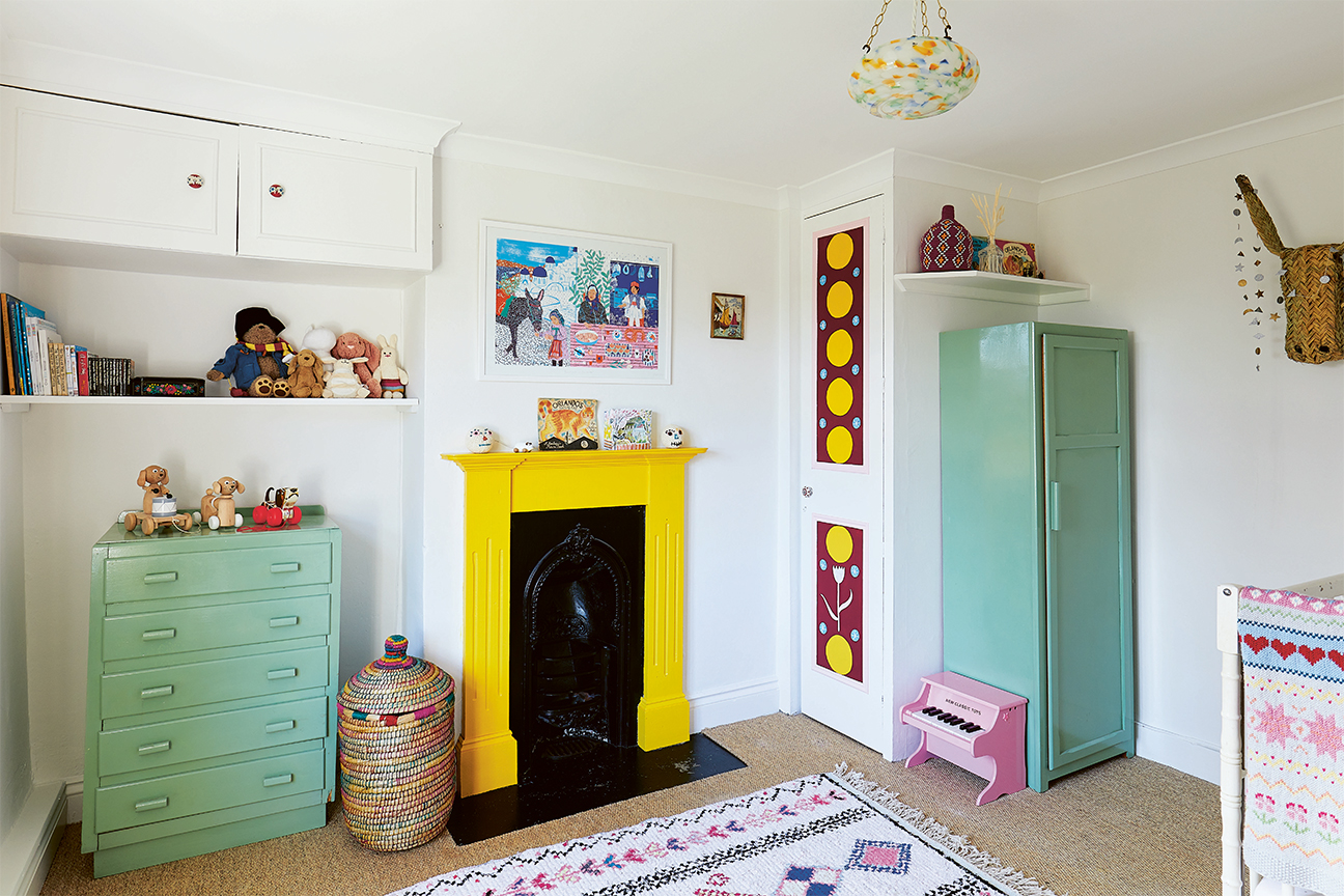 white room with yellow fireplace