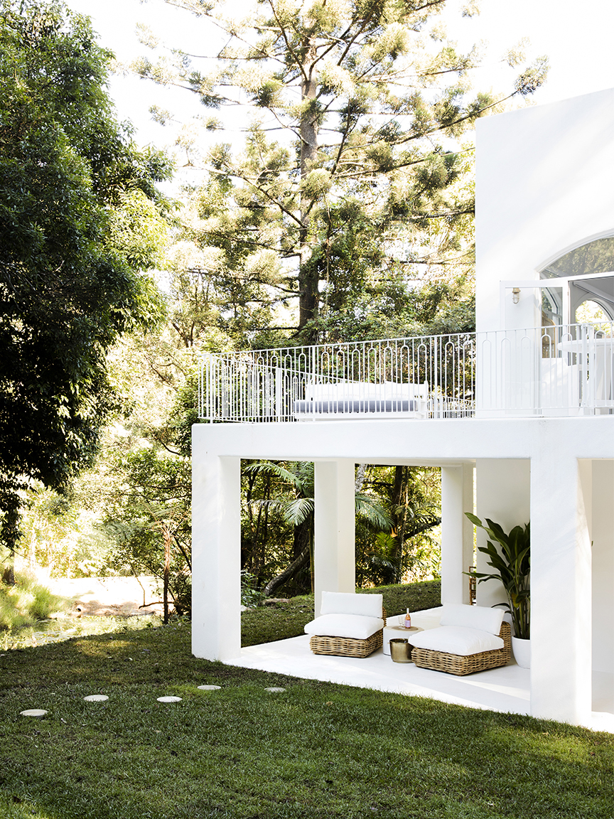 white house with spacious green lawn