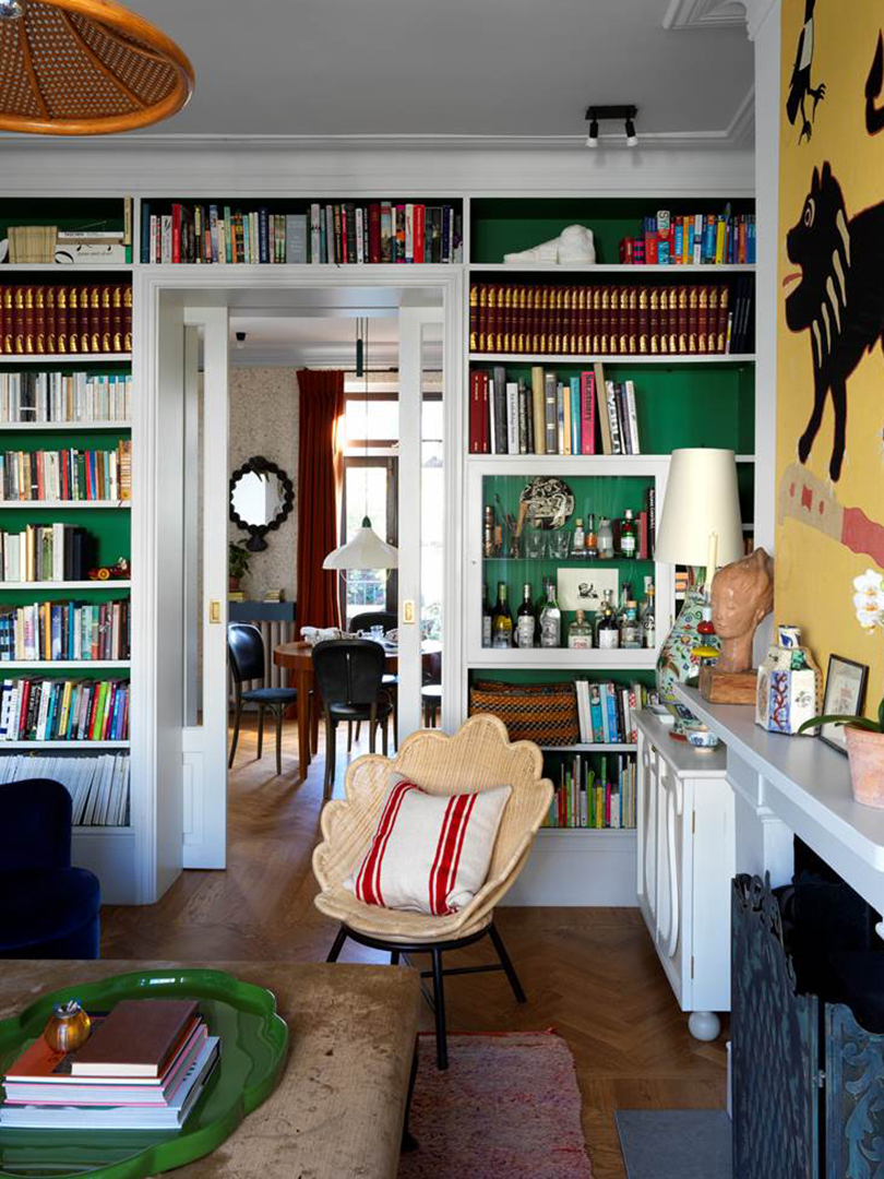 emerald green build in bookcase in living room