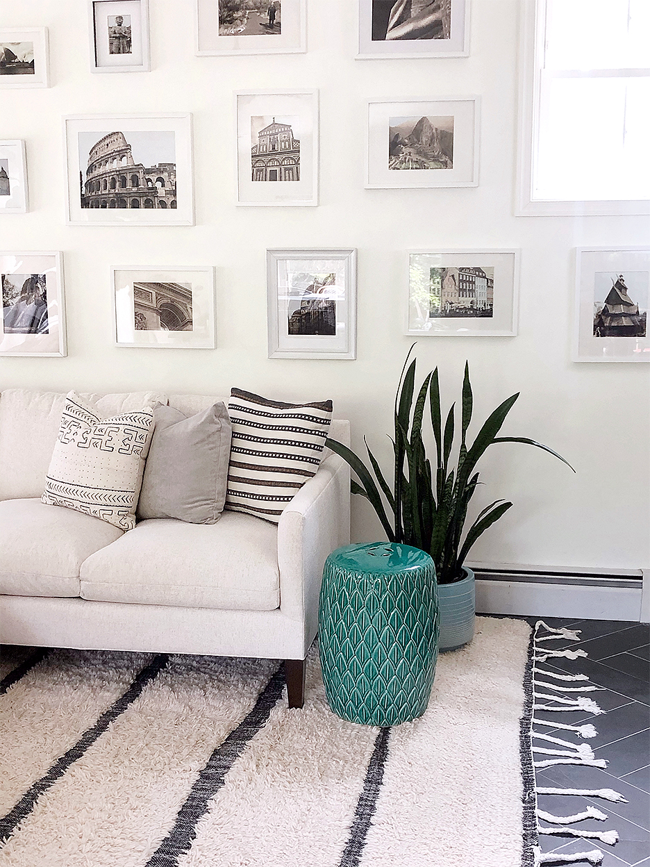 Living room with white sofa and rug