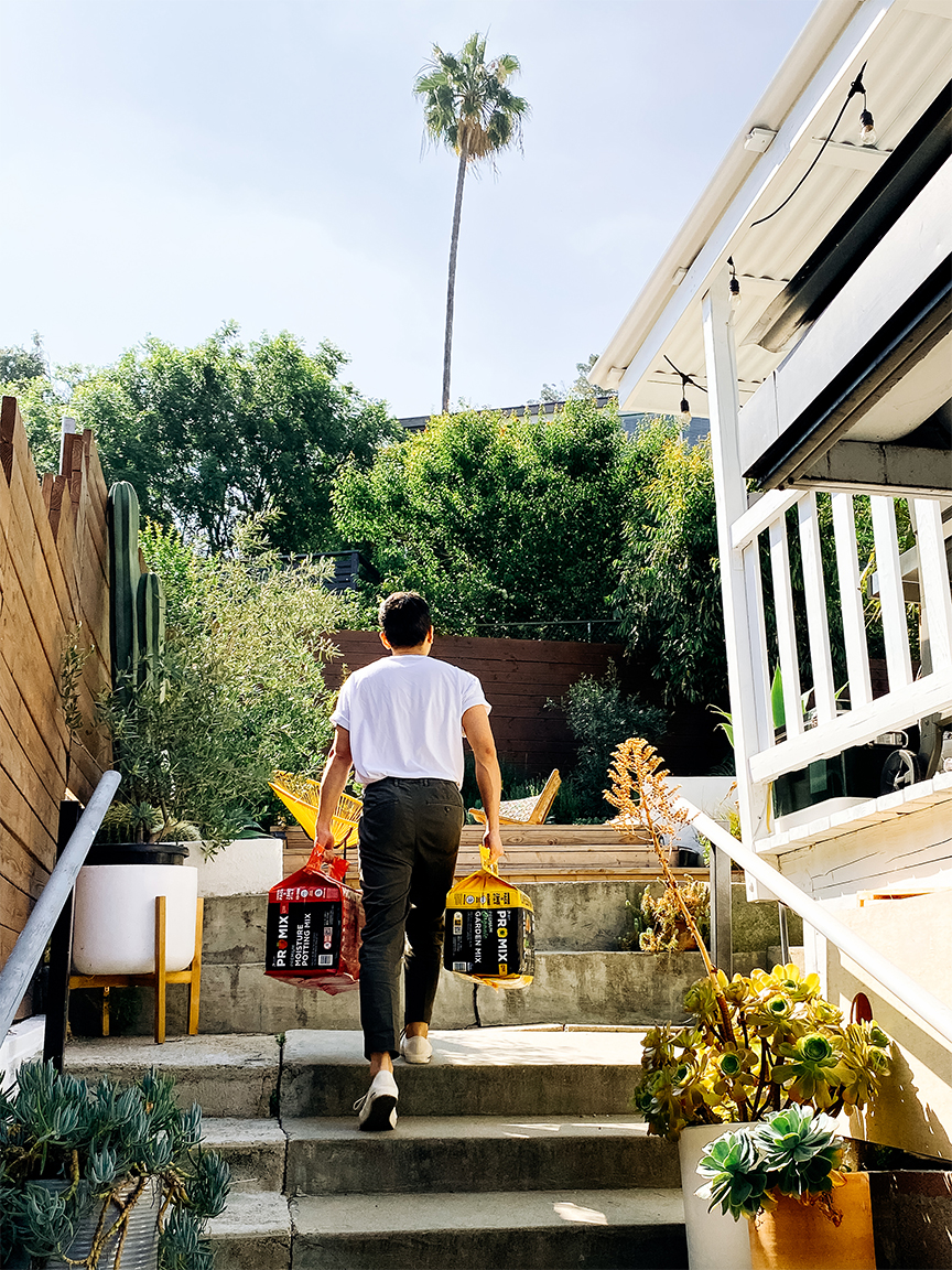 man walking up outdoor steps