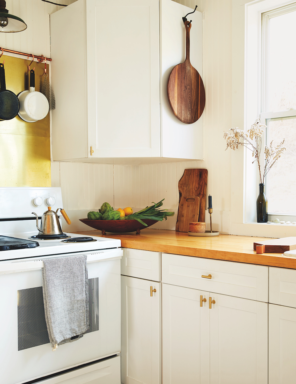 white cabinets with wood counter