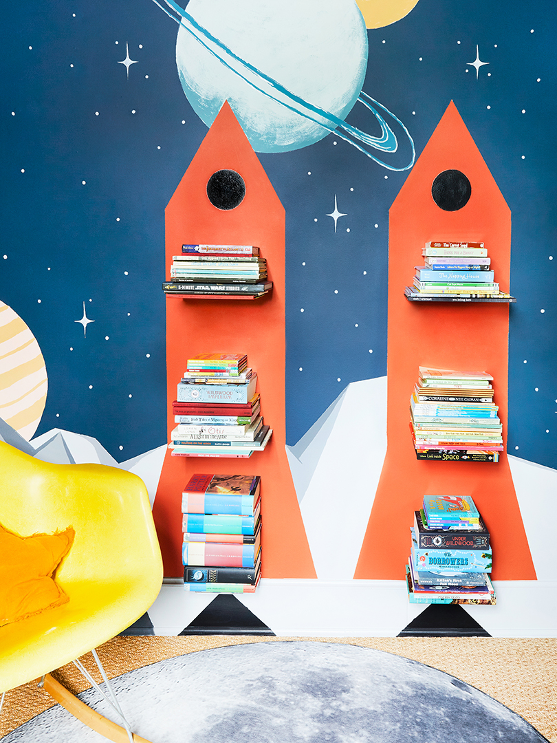 Red rocket shelves in kids room