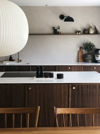 Dark brown kitchen with large lantern