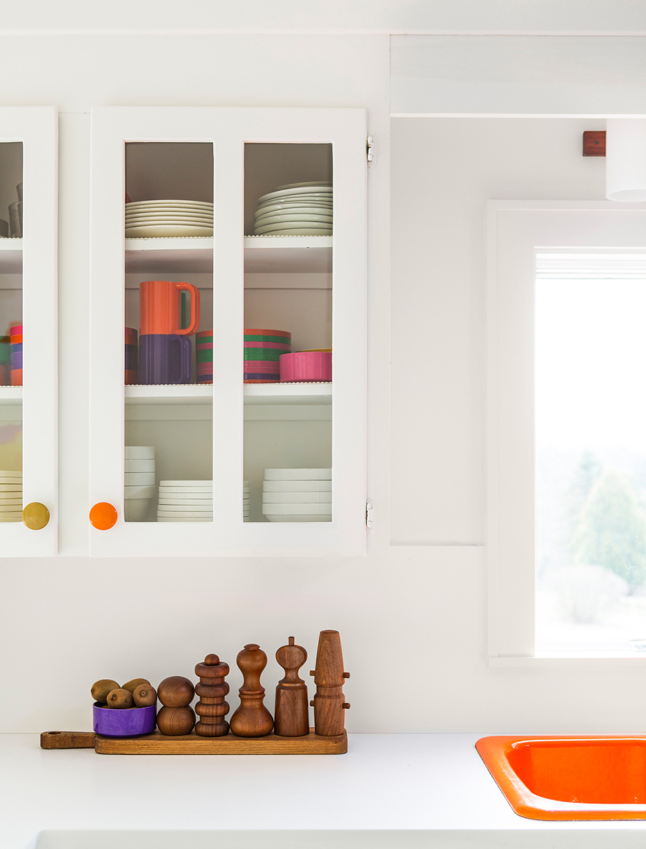 white kitchen cabinets with glass fronts