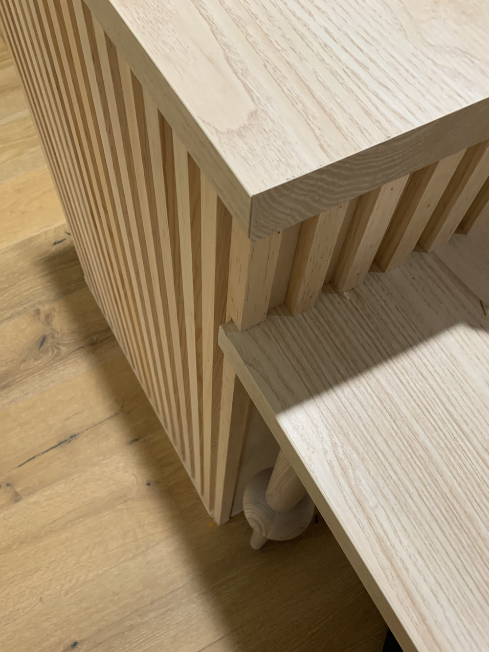 wood slots on kitchen island