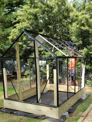 With a Few Minor Tweaks, This Gardener Made Her $400 Greenhouse Her Own