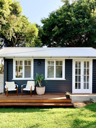 Exterior of blue backyard shed