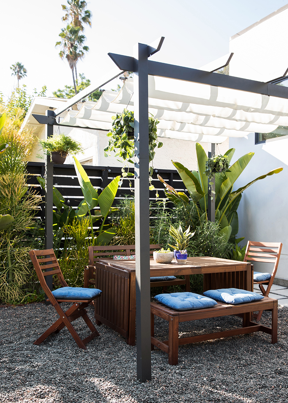 outdoor dining area with wooden furniture