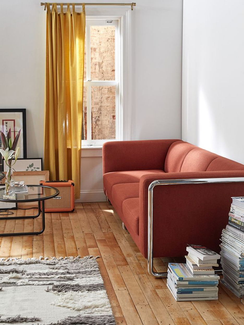 living room with terracotta sofa