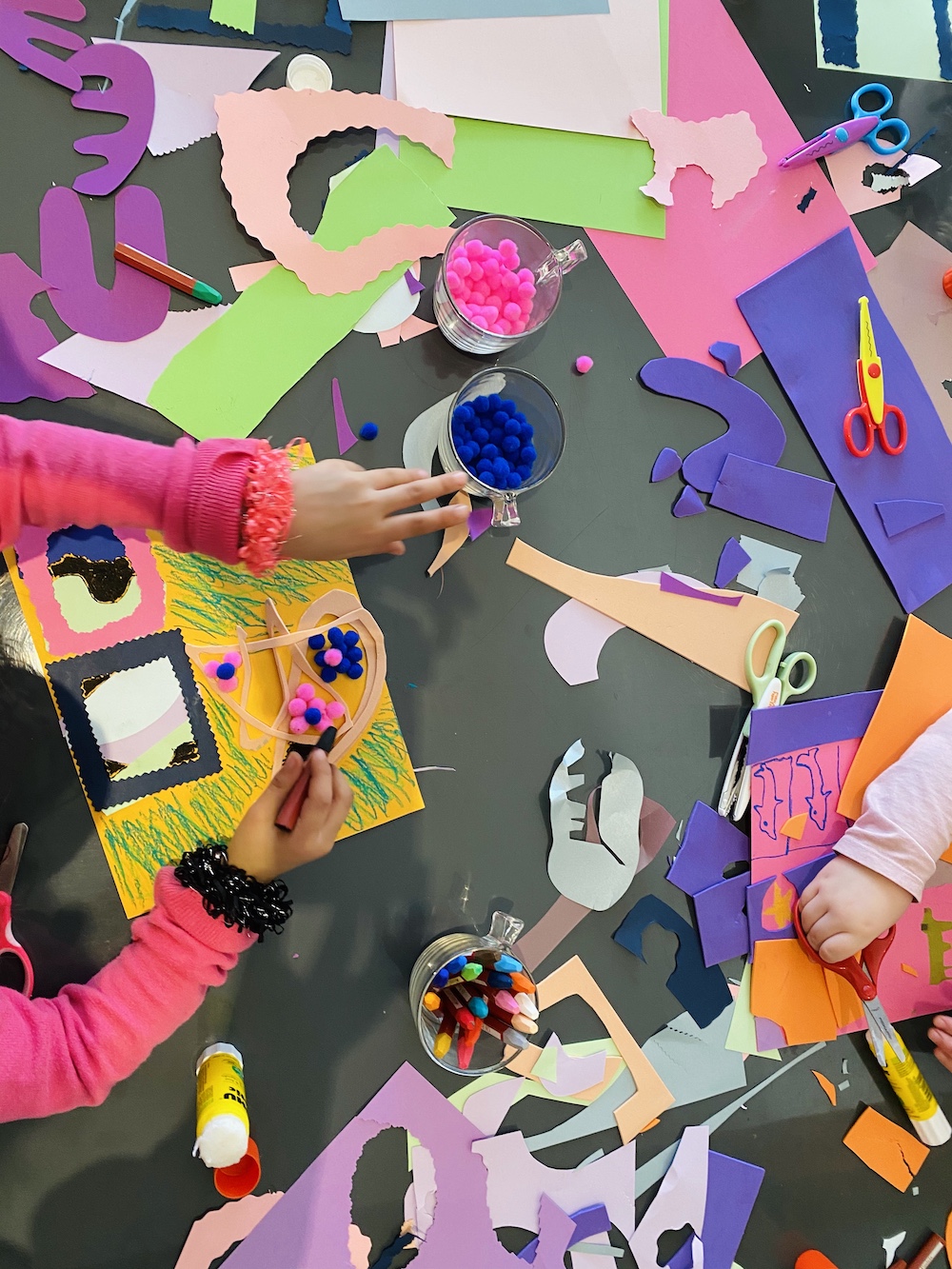 kids at a craft table