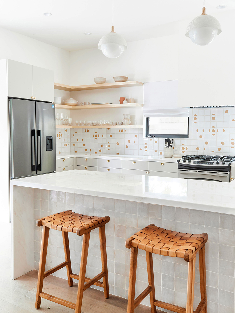 orange and white tile backsplash