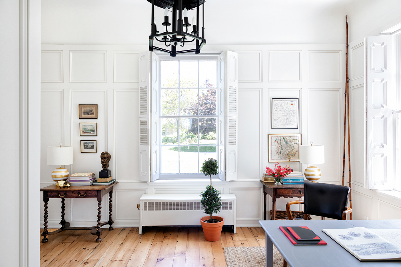 Georgian living room with large windows and white walls