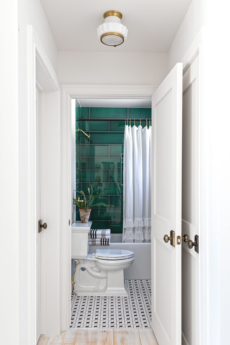 Emerald green tile in bathroom