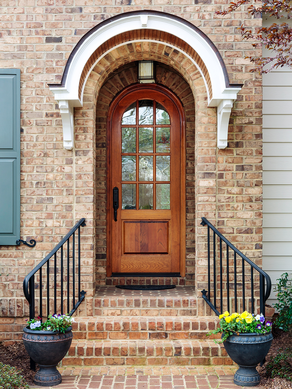 townhouse with brick exterior