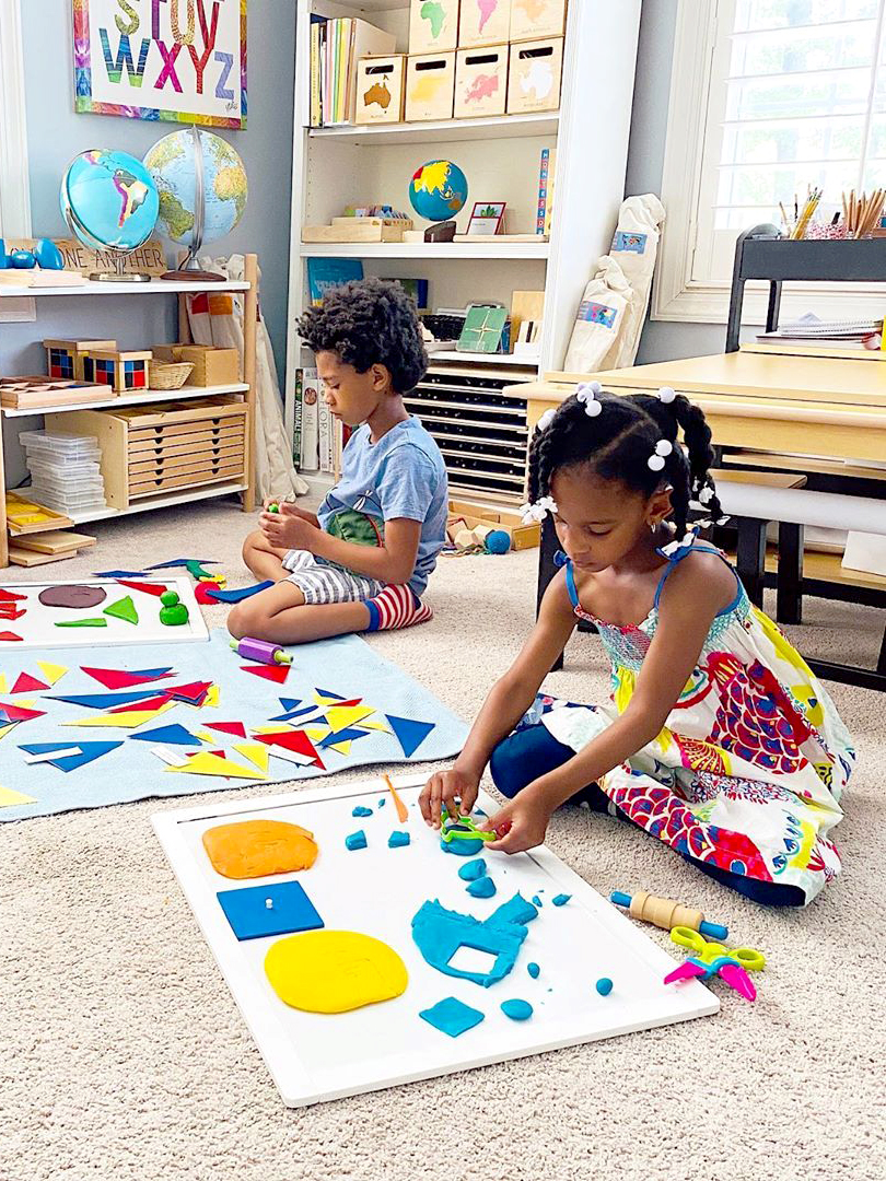 Markëta Howar's kids playing on the floor