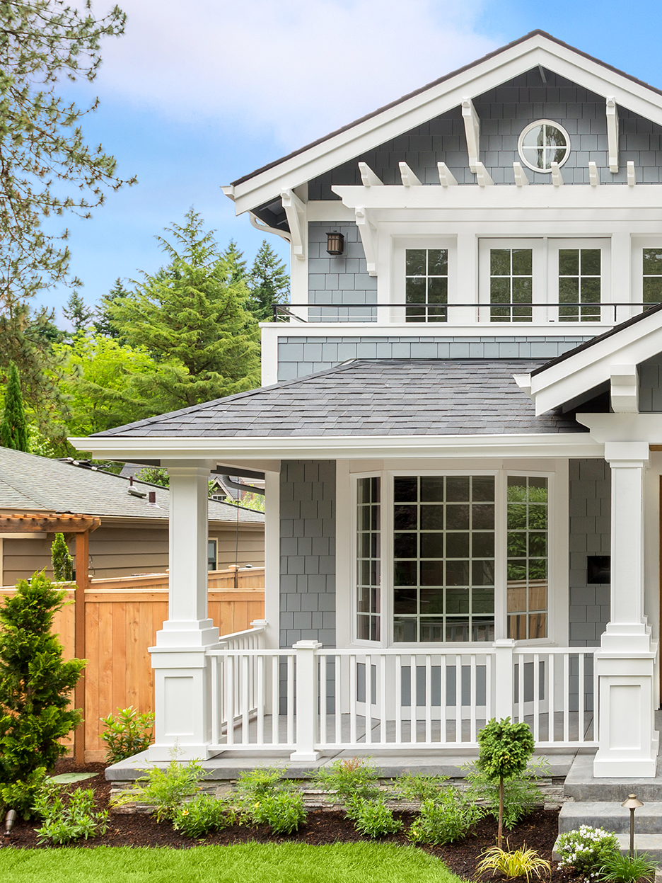 blue house with white porch