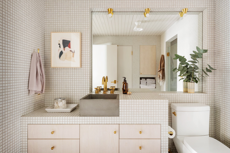 small white tile grids on wall in bathroom