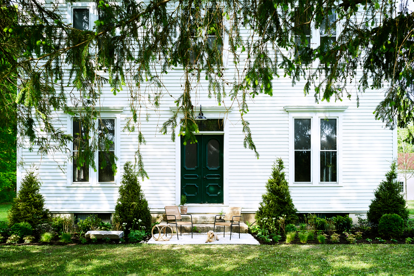 whtie house with green door