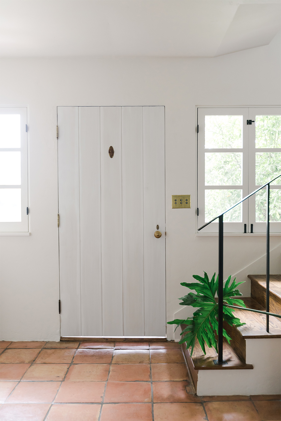 white door of spanish style home