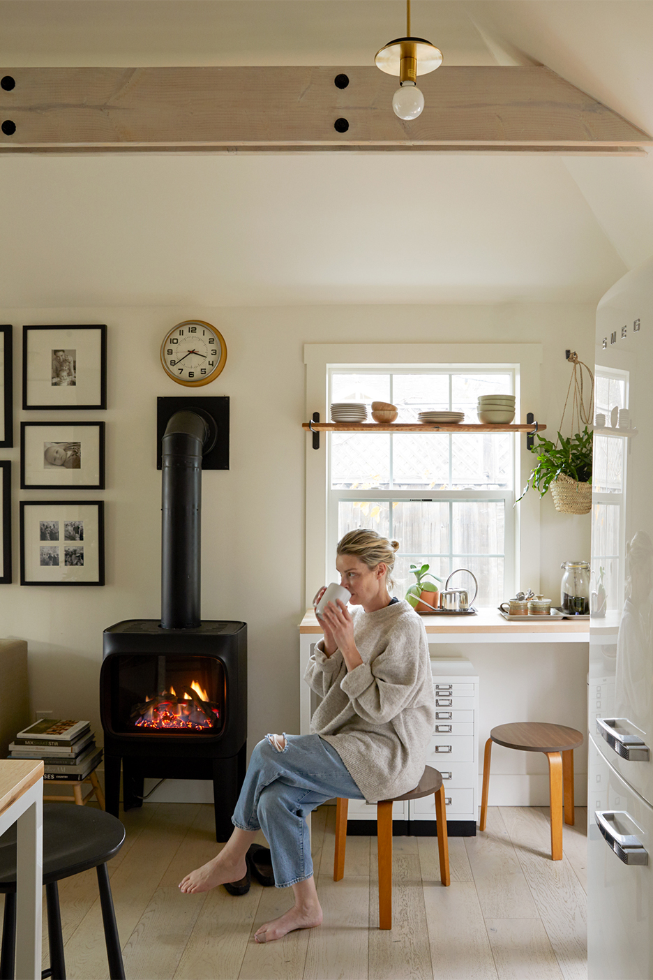 Julie next to her stove