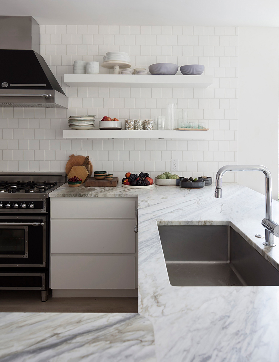 white kitchen marble countertops and open shelving