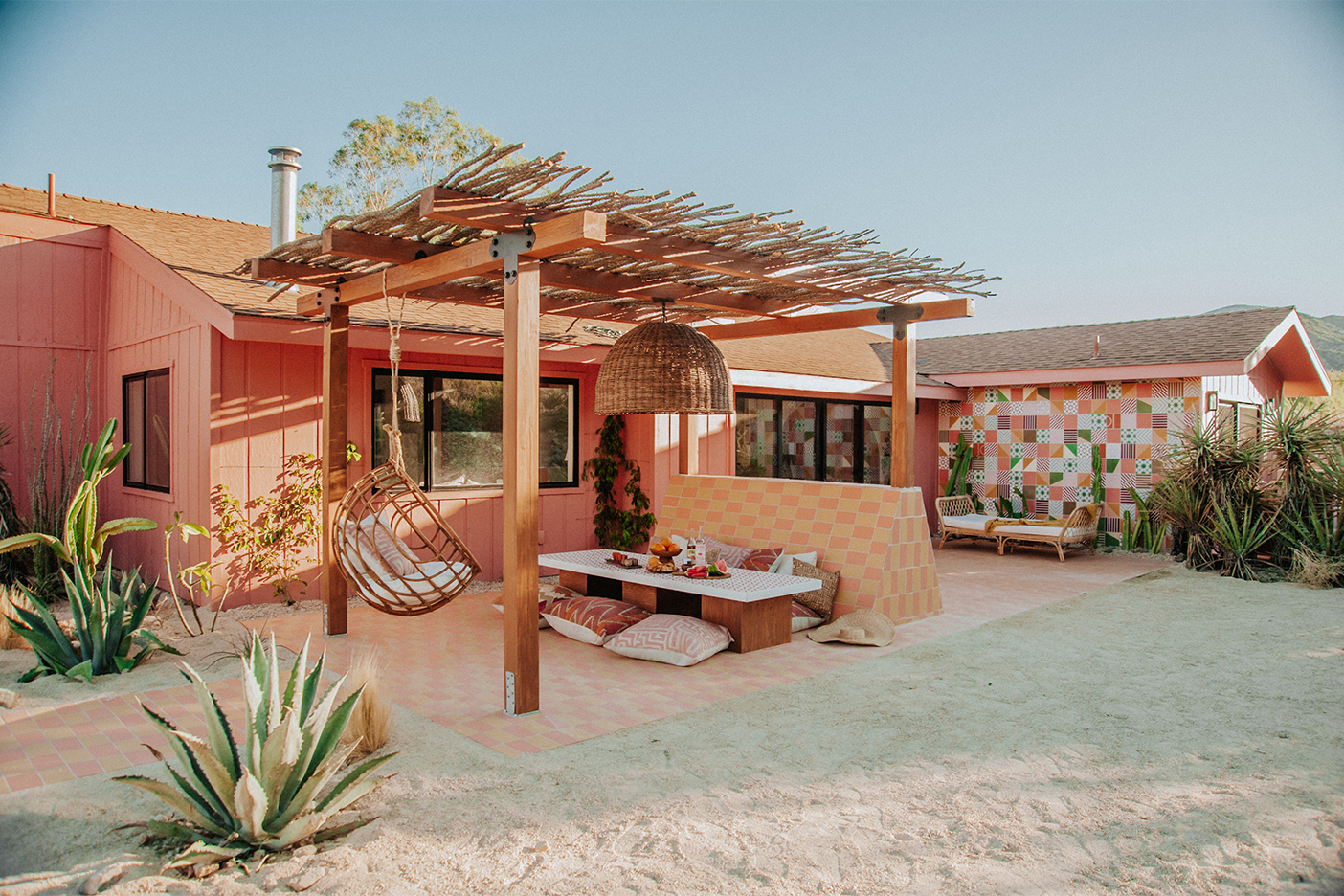 pink house with pergola