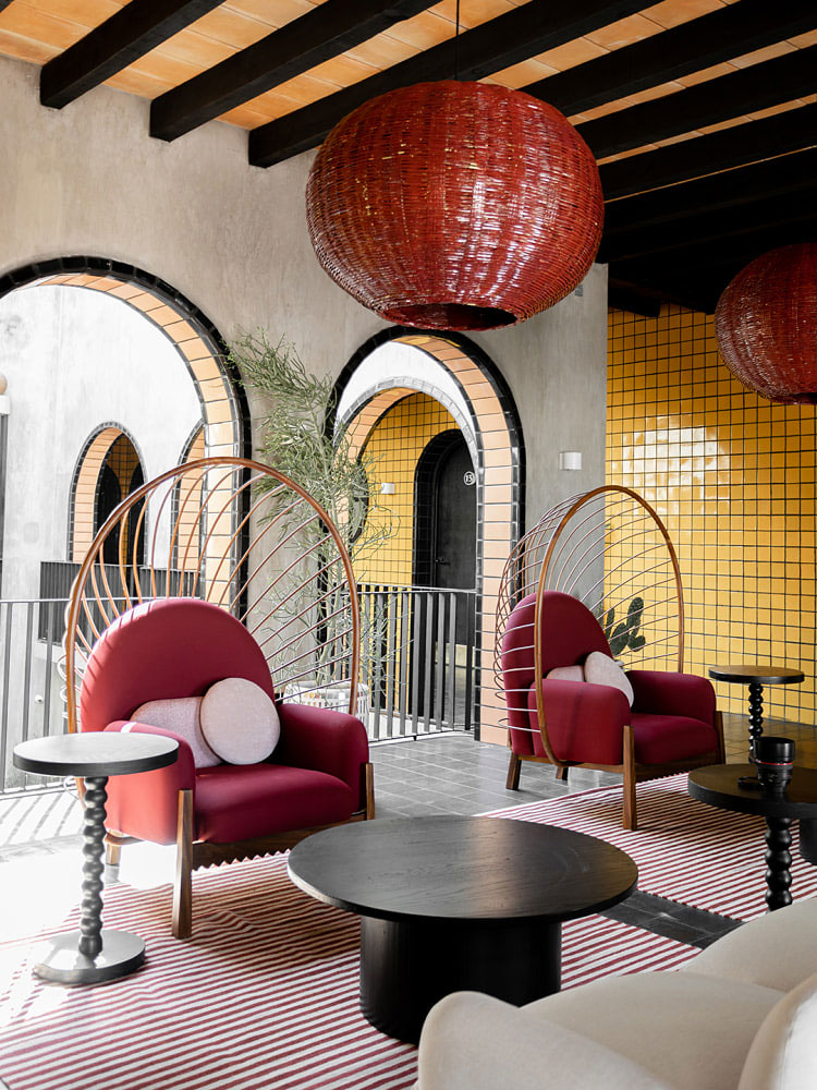 red and yellow tiled hotel lobby