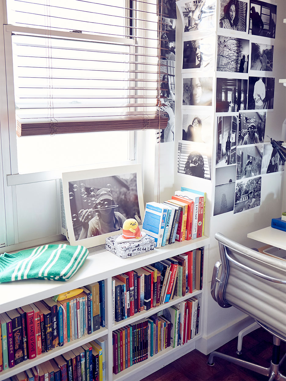 Corner of bedroom with bookshelves