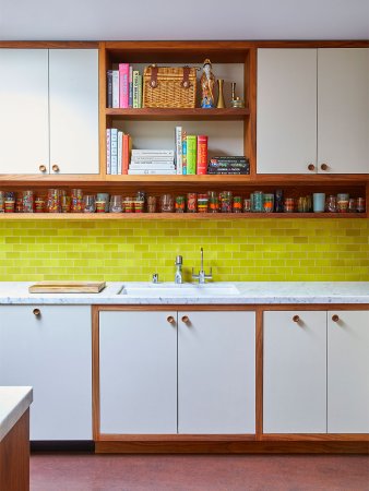 Kitchen with neon backsplash