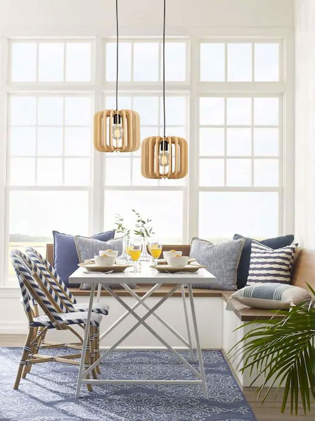 dining room with pendant lights over table