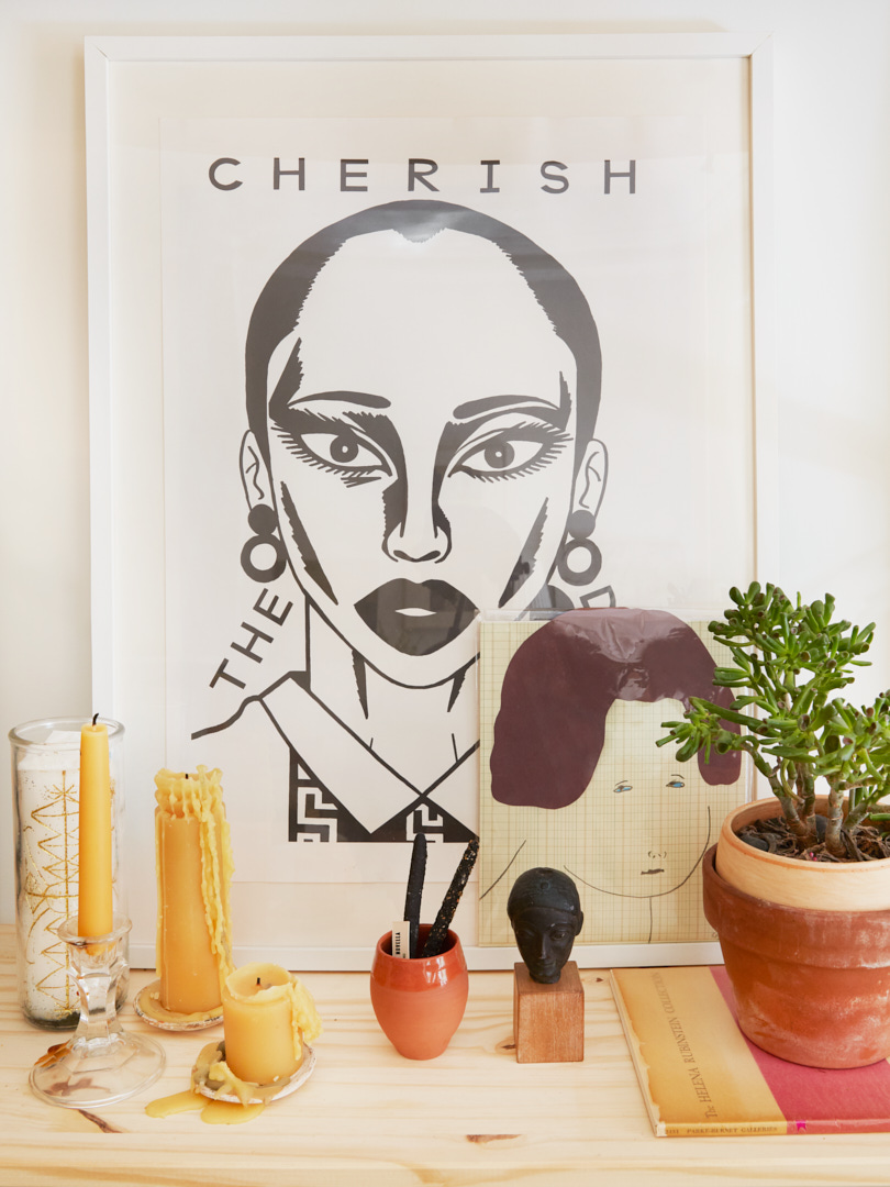 Sade art on bookshelf