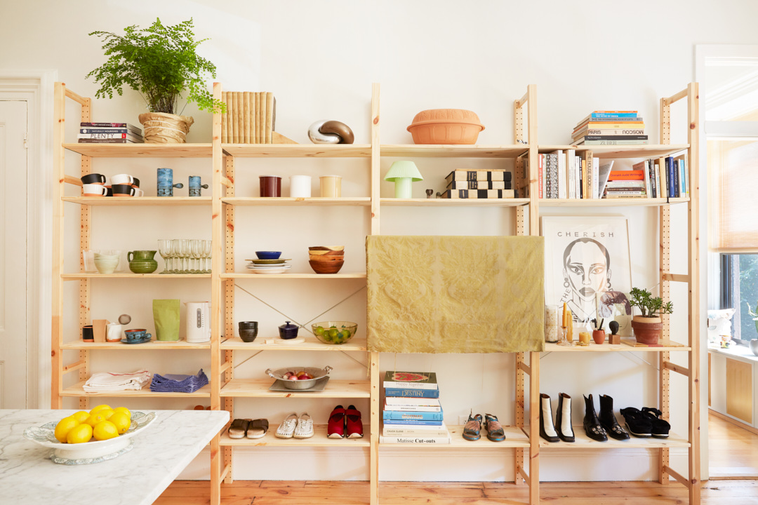 IKEA Ivar bookshelf with books and shoes