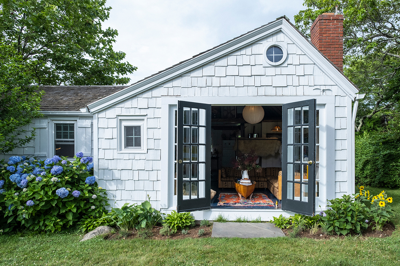 cottage with doors open