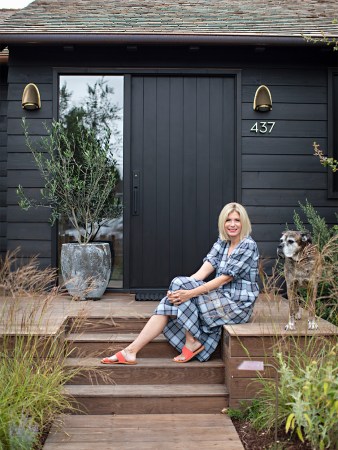 woman sitting on front steps