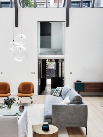 living room with high glass ceilings