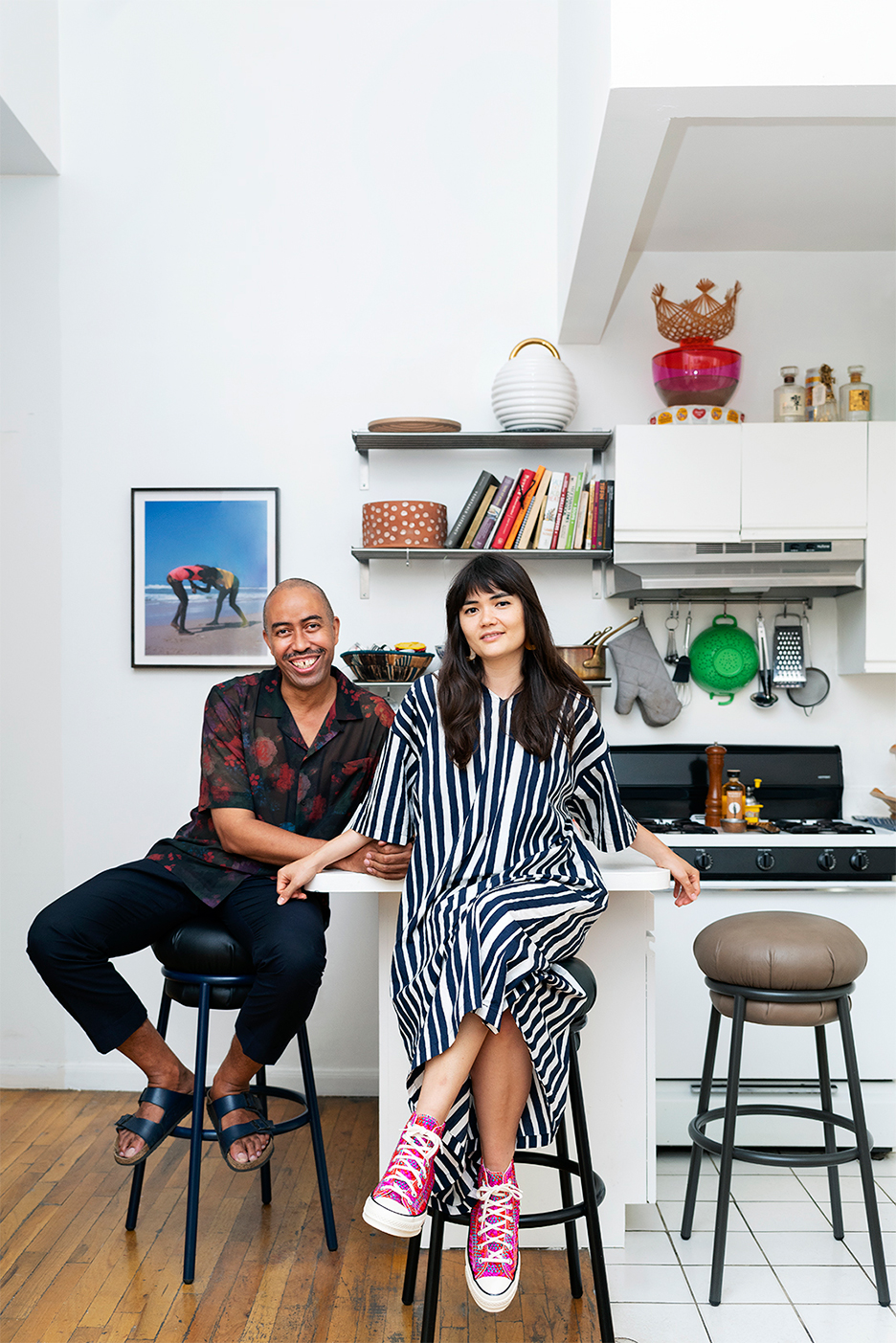 Stephen and Malika sitting at kitchen counter