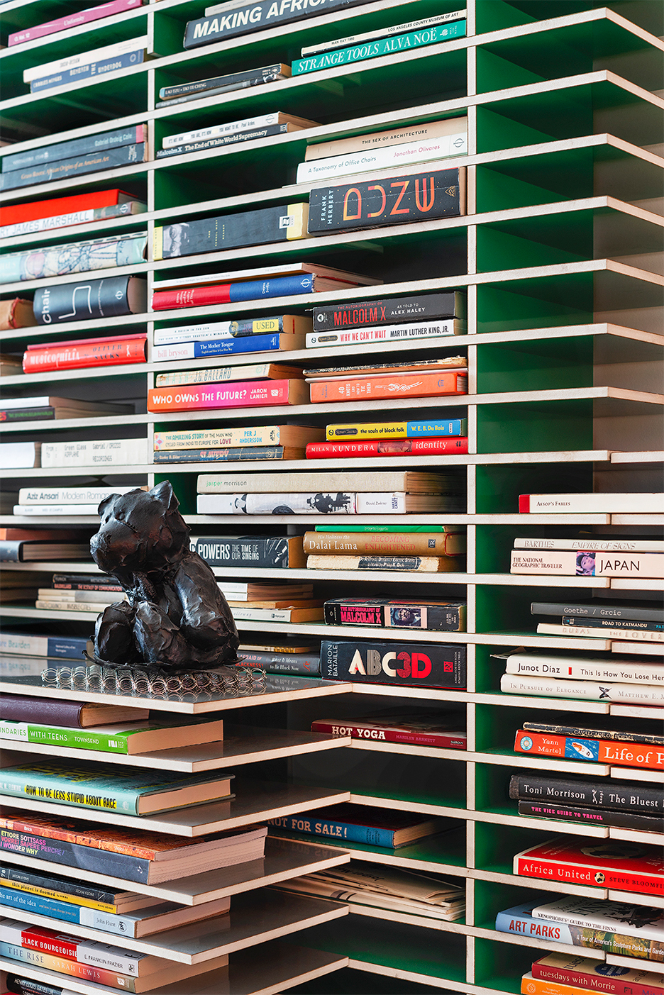 close-up of modern bookshelves with narrow slots