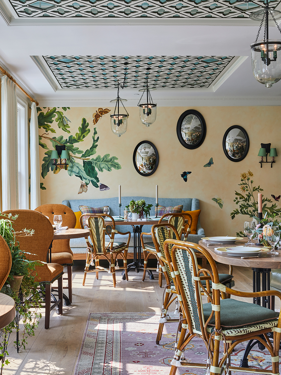 dining room with wall paper on ceiling