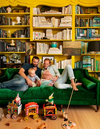 fathers and son on green velvet sofa