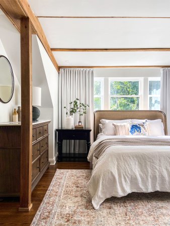 bedroom with wood beams